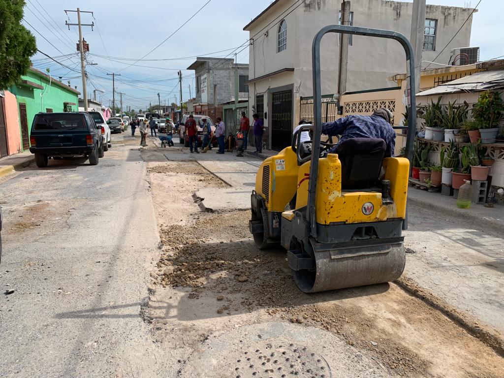 a yellow vehicle on a street